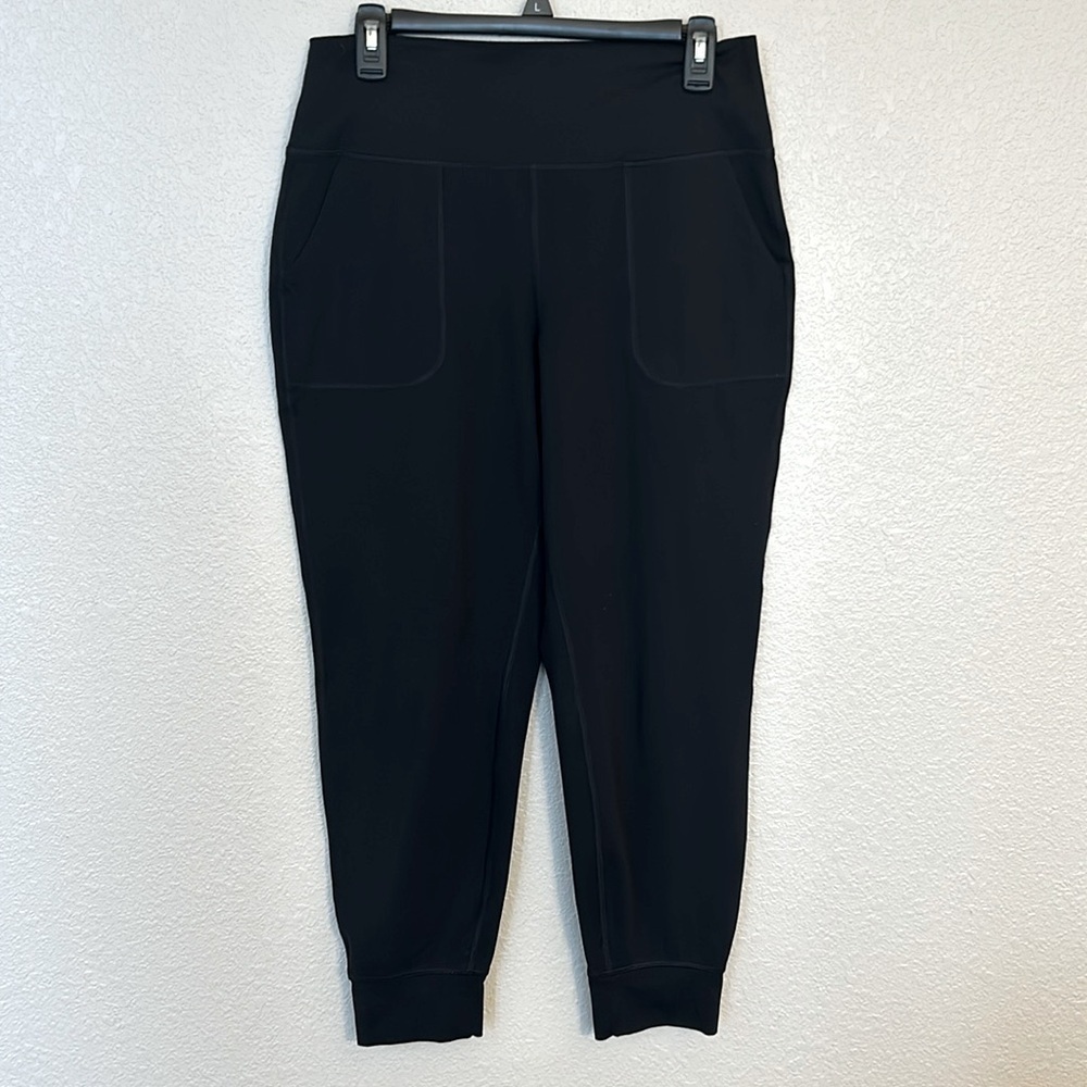 Women’s black Calvin Klein joggers size large.